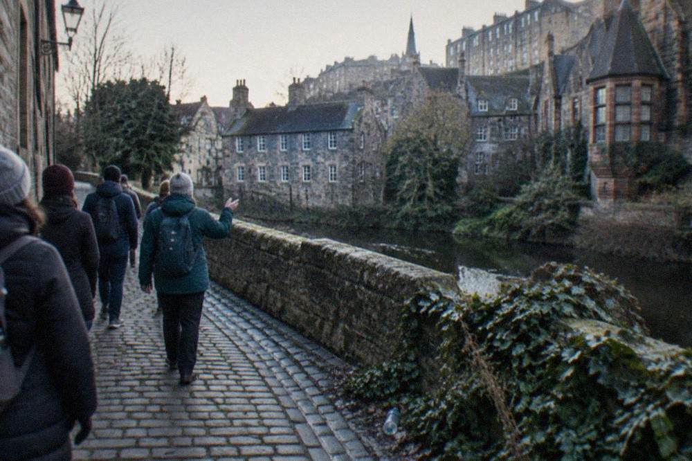 Cobbled lane and stone buildings beside the Water of Leith in Dean Village