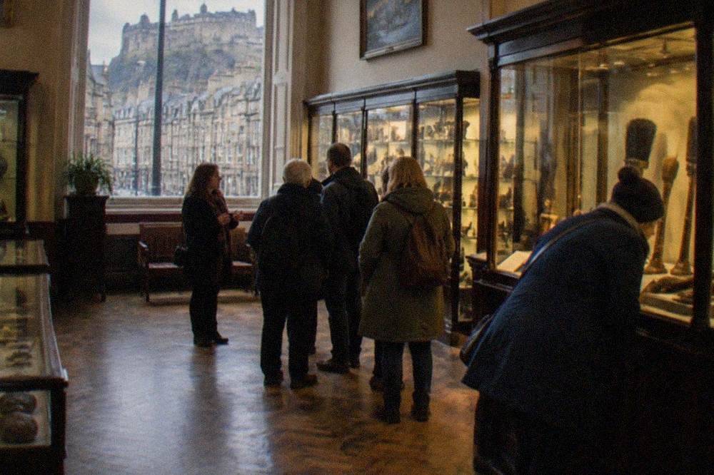 Museum gallery interior with glass display cases and surgical exhibits