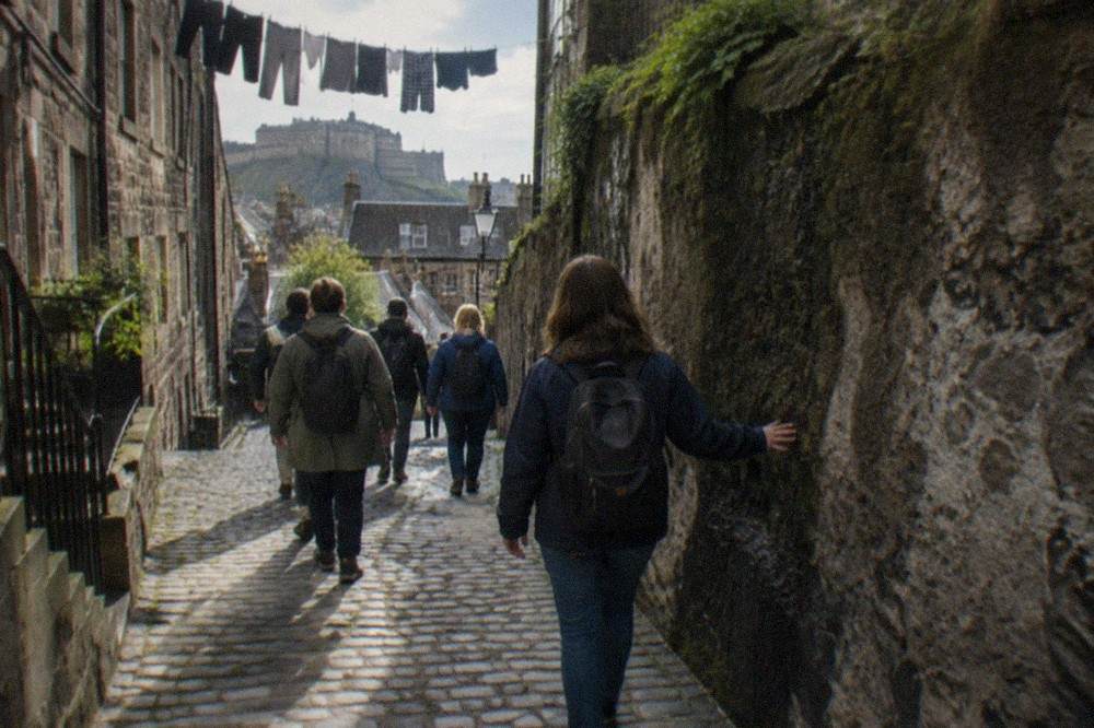 Stone closes and narrow alleys leading off a historic Edinburgh street
