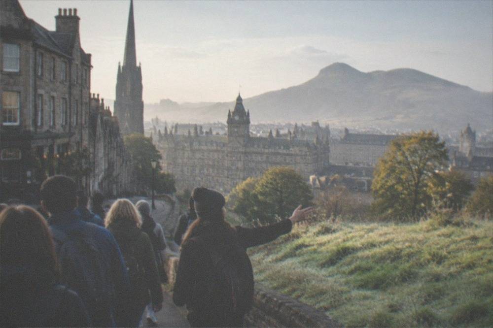 Arthur's Seat rising above the Holyrood parkland behind the Parliament building