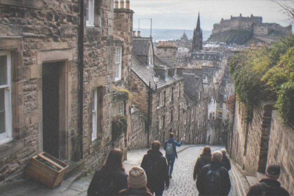 View over Edinburgh Old Town rooftops towards the castle on the hill
